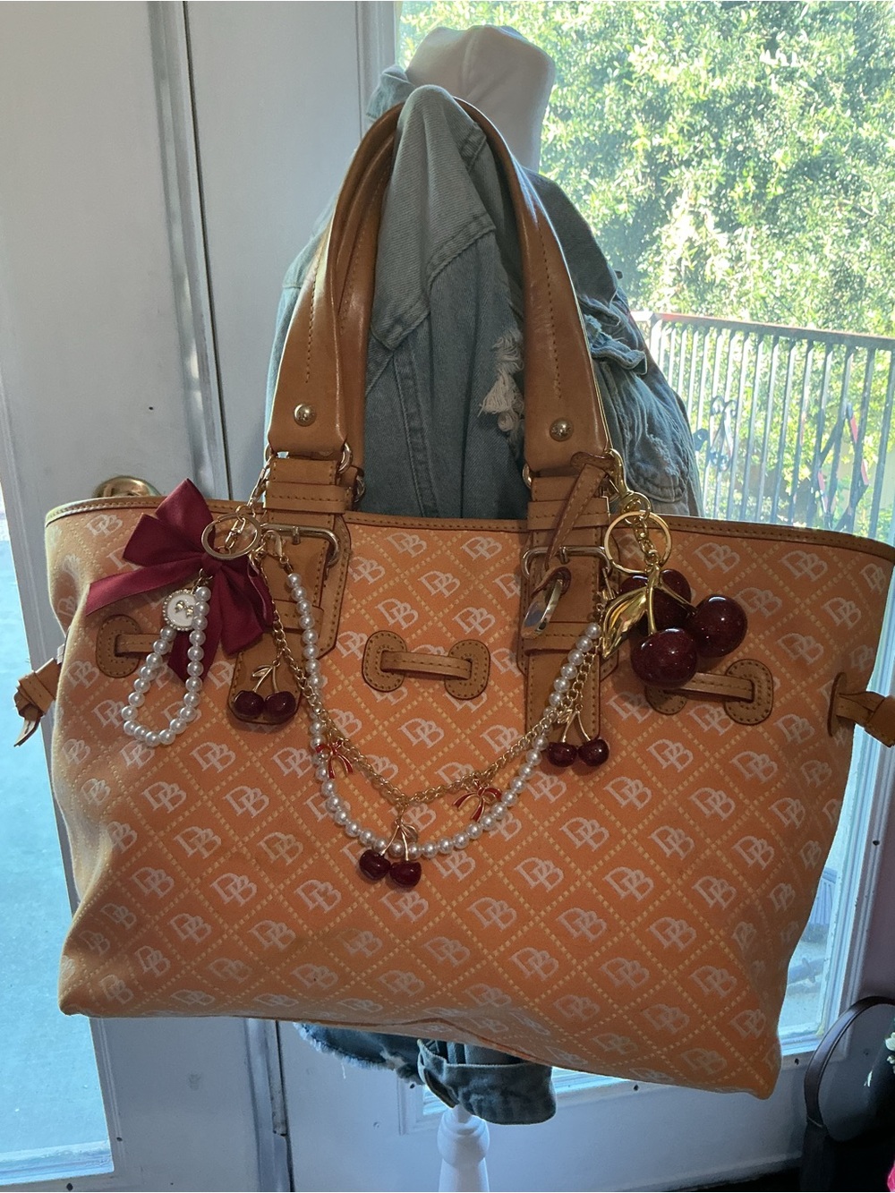 Dooney & Bourke Tan Tote with Cherry Charm and Pearl Accents